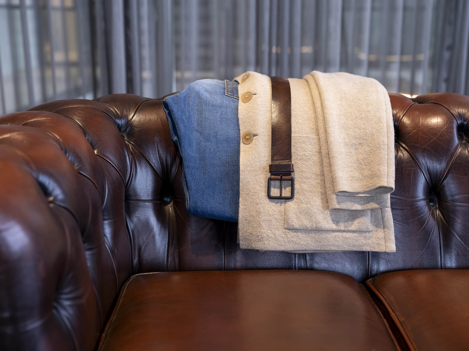 Presly & Sun outfit on sofa